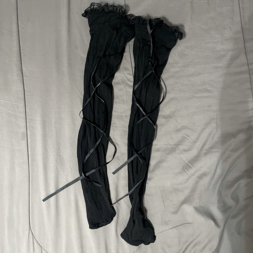 Lace up thigh highs! Frilly around the seams with black ribbon lace :)